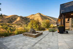 View of patio featuring a mountain view