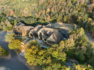 View of property location with a heavily wooded area