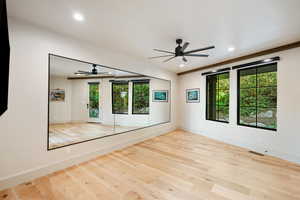 Unfurnished room featuring light wood-style floors, recessed lighting, and ceiling fan