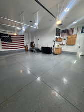 Garage featuring a garage door opener