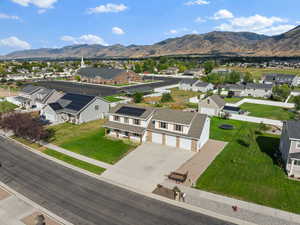 Aerial view of residential area with a mountain backdrop