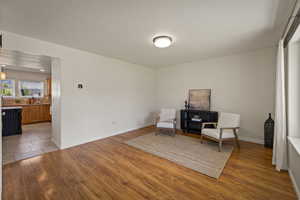 Sitting room featuring light wood-type flooring