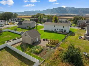 Aerial view of residential area featuring a mountain backdrop