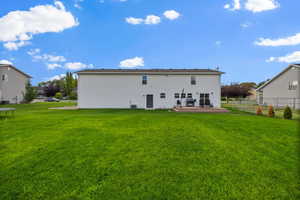 Rear view of property with a deck
