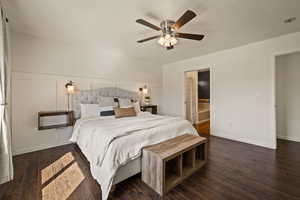 Bedroom with dark wood-type flooring and a ceiling fan