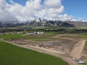 View of mountain background featuring rural landscape