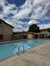Community pool featuring a patio area