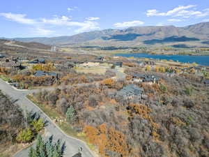 View of property location with a water and mountain view