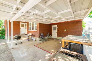 View of patio featuring area for grilling