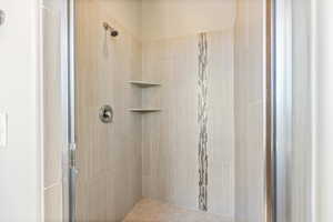 Bathroom featuring a shower stall