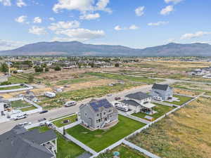 Aerial view of residential area featuring mountains