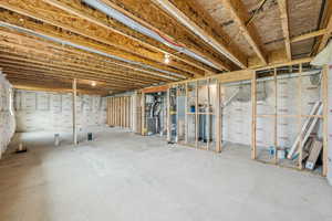 Unfinished basement with heating unit
