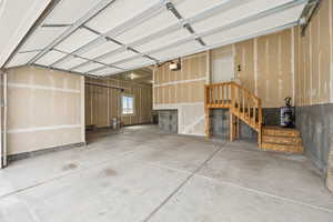 Garage featuring a garage door opener