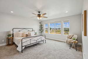 Bedroom with carpet floors, recessed lighting, and a ceiling fan