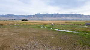 View of mountain background with rural landscape and a pastoral area