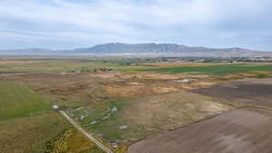 Aerial view of property and surrounding area with rural landscape and mountains