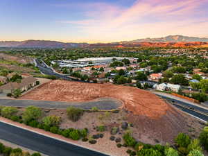 Aerial view of residential area featuring mountains
