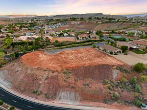 Aerial view at dusk of a residential view and a mountain view