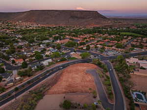 Aerial view at dusk of a residential view and a mountain view
