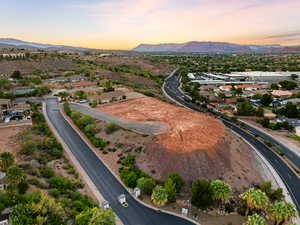 Aerial view of residential area with a mountain backdrop