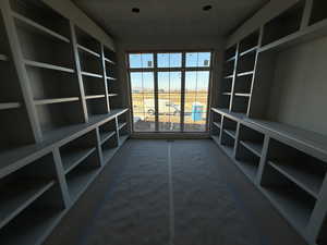 Den with Cabinets and lots of natural light.
