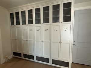 Mudroom featuring dark wood-style floors