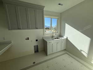 Laundry room with cabinet space and washer hookup