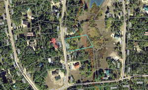 Aerial map of property and surrounding area with property parcel outlined