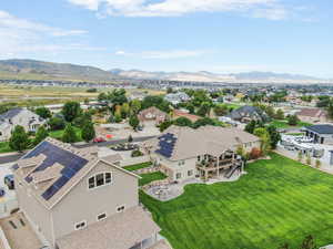 Aerial view of residential area with a mountainous background