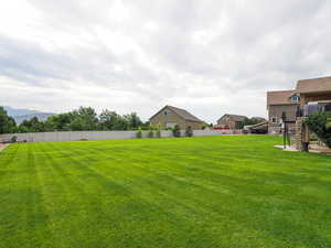 View of yard featuring stairs