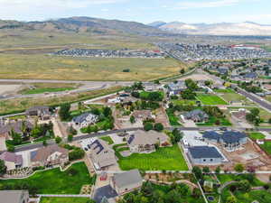 Aerial view of residential area with a mountainous background