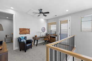 Home office with light carpet, a ceiling fan, and recessed lighting