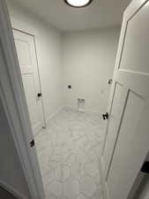 Laundry room featuring hookup for an electric dryer and washer hookup