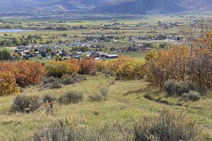 View of mountain backdrop with a nearby body of water