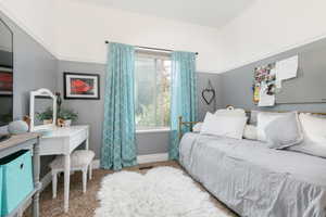 Carpeted bedroom 2 with baseboards