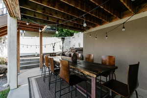 View of patio with outdoor dining space
