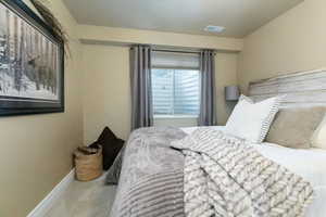 Carpeted bedroom 4 with baseboards
