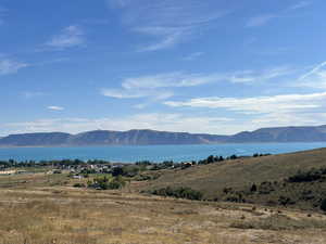 View of mountain background with a large body of water