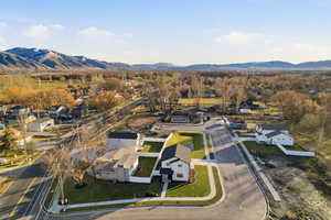 Aerial view of residential area with a mountainous background