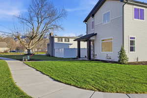 View of side of property with board and batten siding