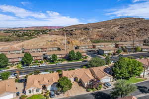 Aerial view of residential area with a mountainous background