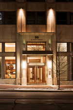 View of exterior entry at night