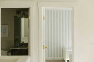 Bathroom featuring vanity and toilet