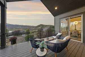 Deck at dusk with a mountain view