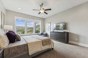 Bedroom featuring carpet floors, a ceiling fan, and recessed lighting
