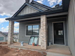 Property entrance with a porch