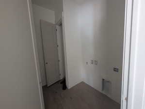 Laundry room featuring baseboards