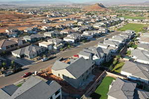 Aerial view of residential area featuring a mountain backdrop