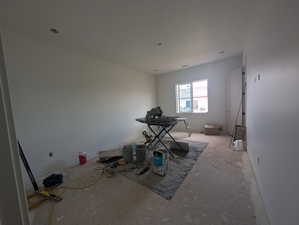 Unfurnished dining area with baseboards