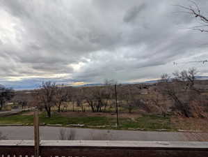 View of mountain background featuring rural landscape